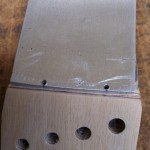 holes on the fingerboard